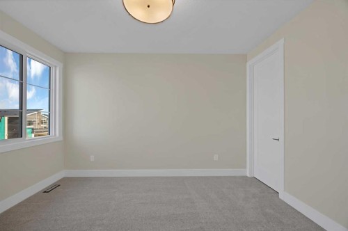 506 Waterford Rise, Chestermere, AB - Indoor Photo Showing Other Room
