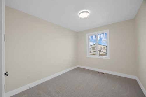 506 Waterford Rise, Chestermere, AB - Indoor Photo Showing Other Room