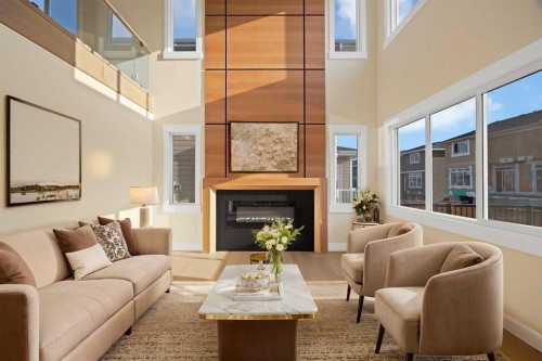 506 Waterford Rise, Chestermere, AB - Indoor Photo Showing Living Room With Fireplace
