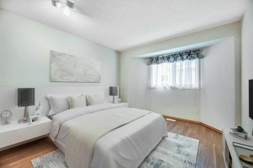 33 Riverview Point Se, Calgary, AB - Indoor Photo Showing Bedroom