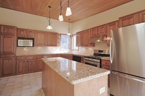 4904 Verulum Place Nw, Calgary, AB - Indoor Photo Showing Kitchen With Stainless Steel Kitchen With Double Sink