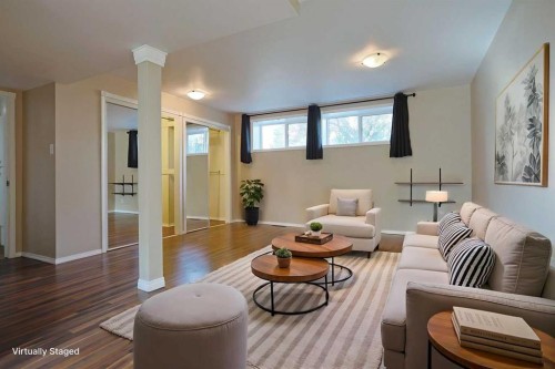4904 Verulum Place Nw, Calgary, AB - Indoor Photo Showing Living Room