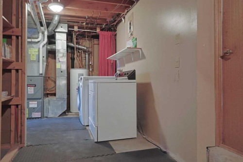 4904 Verulum Place Nw, Calgary, AB - Indoor Photo Showing Laundry Room