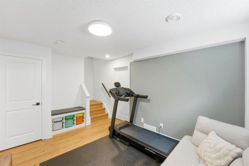 564 Evanston Drive Nw, Calgary, AB - Indoor Photo Showing Gym Room