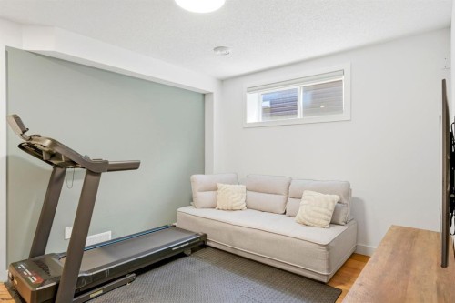 564 Evanston Drive Nw, Calgary, AB - Indoor Photo Showing Gym Room