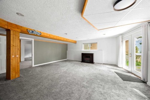 1064 Evergreen Circle, Canmore, AB - Indoor With Fireplace