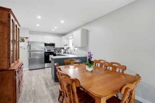 3056 32A Street Se, Calgary, AB - Indoor Photo Showing Dining Room