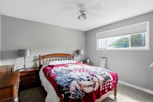 3056 32A Street Se, Calgary, AB - Indoor Photo Showing Bedroom