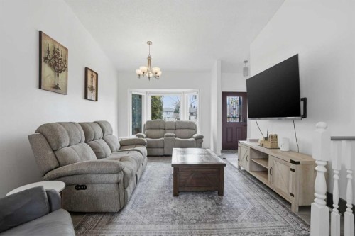 203 Shawglen Road Sw, Calgary, AB - Indoor Photo Showing Living Room