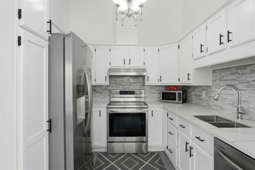 203 Shawglen Road Sw, Calgary, AB - Indoor Photo Showing Kitchen With Double Sink With Upgraded Kitchen