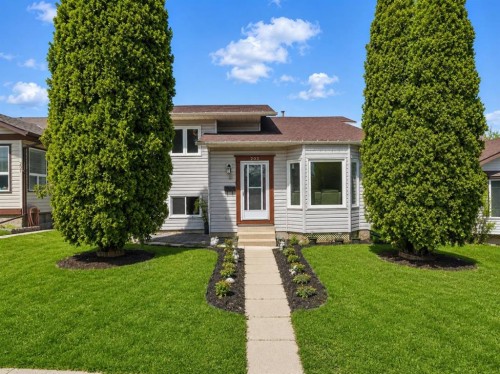 203 Shawglen Road Sw, Calgary, AB - Outdoor With Facade