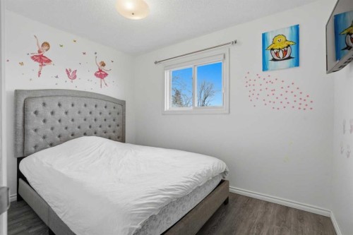 203 Shawglen Road Sw, Calgary, AB - Indoor Photo Showing Bedroom