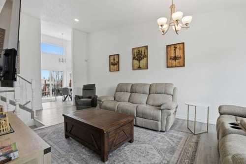 203 Shawglen Road Sw, Calgary, AB - Indoor Photo Showing Living Room