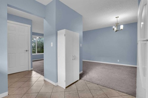 6 Jensen Crescent Ne, Airdrie, AB - Indoor Photo Showing Other Room