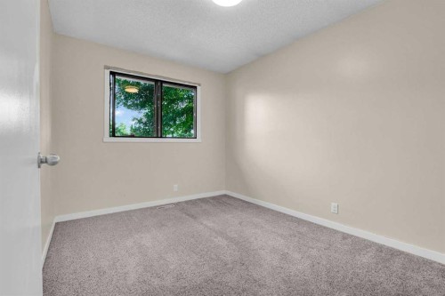 6 Jensen Crescent Ne, Airdrie, AB - Indoor Photo Showing Other Room