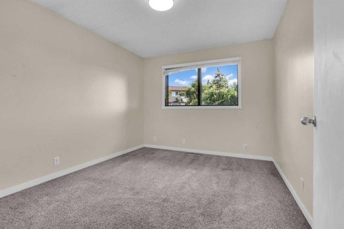 6 Jensen Crescent Ne, Airdrie, AB - Indoor Photo Showing Other Room