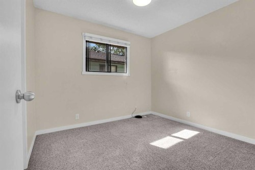 6 Jensen Crescent Ne, Airdrie, AB - Indoor Photo Showing Other Room
