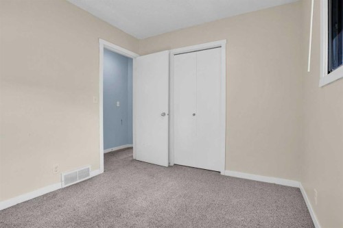 6 Jensen Crescent Ne, Airdrie, AB - Indoor Photo Showing Other Room