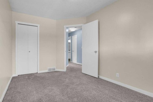 6 Jensen Crescent Ne, Airdrie, AB - Indoor Photo Showing Other Room