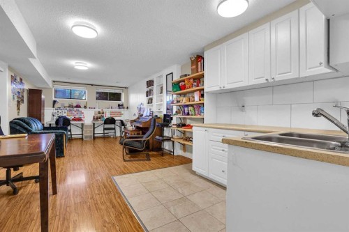 6 Jensen Crescent Ne, Airdrie, AB - Indoor Photo Showing Kitchen With Double Sink