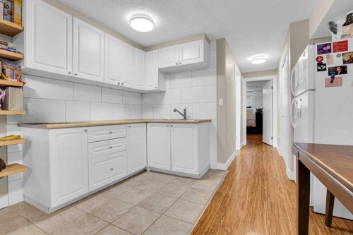 6 Jensen Crescent Ne, Airdrie, AB - Indoor Photo Showing Other Room
