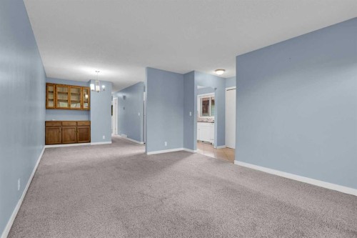 6 Jensen Crescent Ne, Airdrie, AB - Indoor Photo Showing Other Room