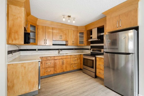 13 Bernard Drive Nw, Calgary, AB - Indoor Photo Showing Kitchen