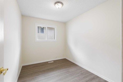 13 Bernard Drive Nw, Calgary, AB - Indoor Photo Showing Other Room