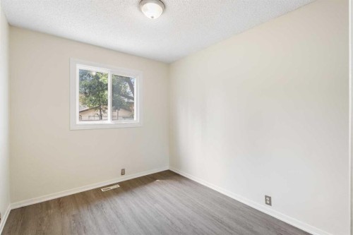 13 Bernard Drive Nw, Calgary, AB - Indoor Photo Showing Other Room