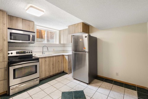 13 Bernard Drive Nw, Calgary, AB - Indoor Photo Showing Kitchen