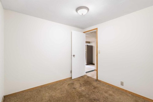 13 Bernard Drive Nw, Calgary, AB - Indoor Photo Showing Other Room