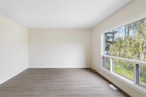 13 Bernard Drive Nw, Calgary, AB - Indoor Photo Showing Other Room