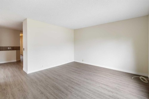 13 Bernard Drive Nw, Calgary, AB - Indoor Photo Showing Other Room