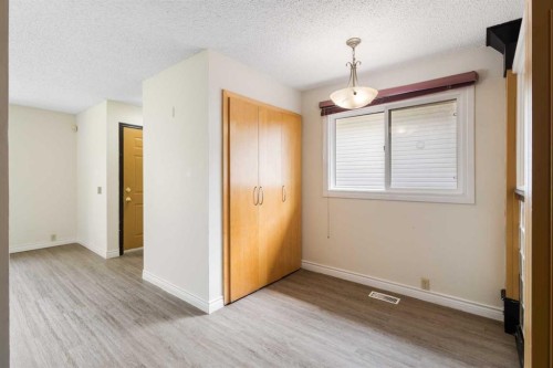 13 Bernard Drive Nw, Calgary, AB - Indoor Photo Showing Other Room