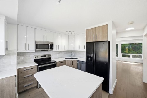 42-123 Queensland Drive Se, Calgary, AB - Indoor Photo Showing Kitchen