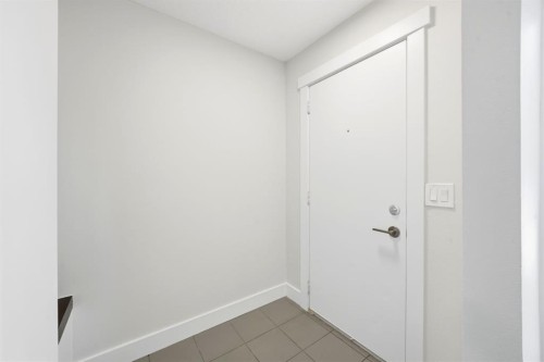 42-123 Queensland Drive Se, Calgary, AB - Indoor Photo Showing Other Room