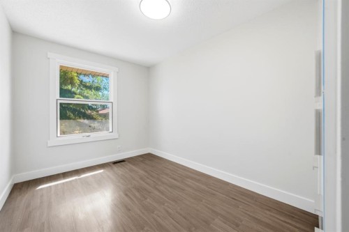 42-123 Queensland Drive Se, Calgary, AB - Indoor Photo Showing Other Room
