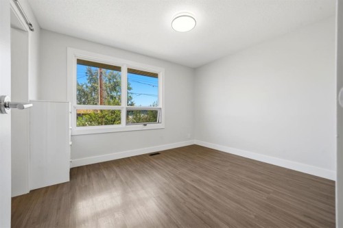42-123 Queensland Drive Se, Calgary, AB - Indoor Photo Showing Other Room