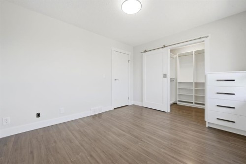 42-123 Queensland Drive Se, Calgary, AB - Indoor Photo Showing Other Room