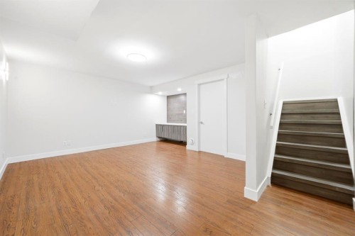 42-123 Queensland Drive Se, Calgary, AB - Indoor Photo Showing Other Room