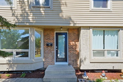 42-123 Queensland Drive Se, Calgary, AB - Outdoor With Exterior
