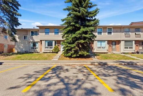 42-123 Queensland Drive Se, Calgary, AB - Outdoor With Facade