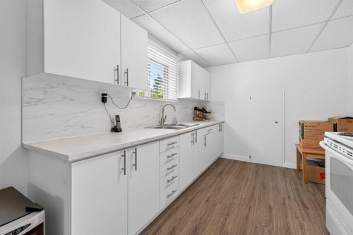 2301 4 Avenue Nw, Calgary, AB - Indoor Photo Showing Kitchen With Double Sink