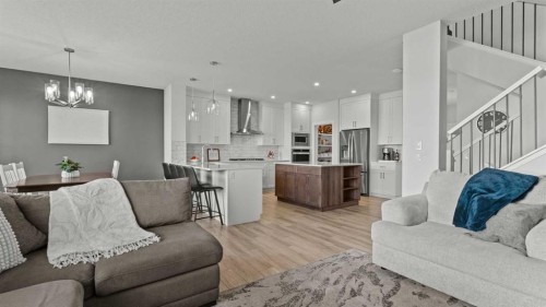 152 Threepoint Cove, Okotoks, AB - Indoor Photo Showing Living Room