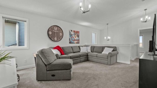 152 Threepoint Cove, Okotoks, AB - Indoor Photo Showing Living Room