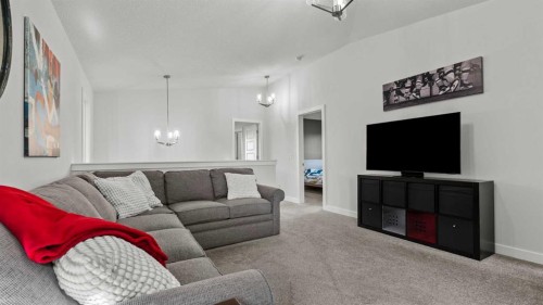 152 Threepoint Cove, Okotoks, AB - Indoor Photo Showing Living Room