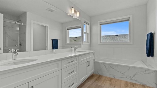 152 Threepoint Cove, Okotoks, AB - Indoor Photo Showing Bathroom