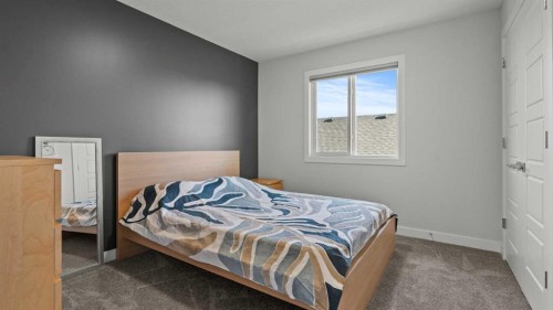 152 Threepoint Cove, Okotoks, AB - Indoor Photo Showing Bedroom
