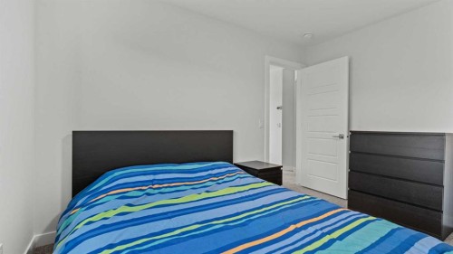 152 Threepoint Cove, Okotoks, AB - Indoor Photo Showing Bedroom