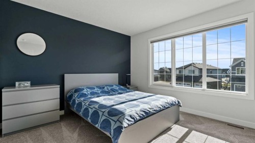 152 Threepoint Cove, Okotoks, AB - Indoor Photo Showing Bedroom
